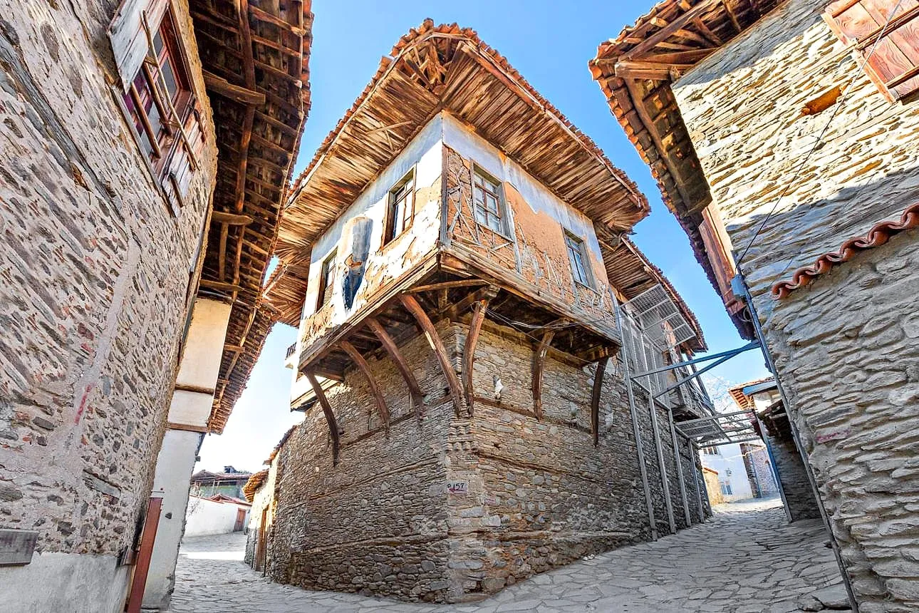 A timber-framed Ottoman house on a cobbled lane in Birgi
