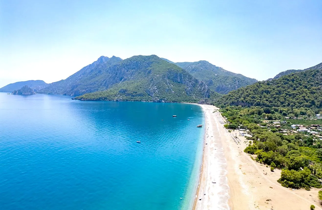 The long beach of Çıralı below the Olympos mountains