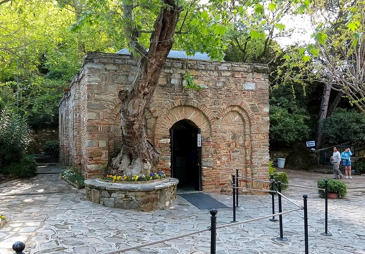 The small stone House of the Virgin Mary among the trees