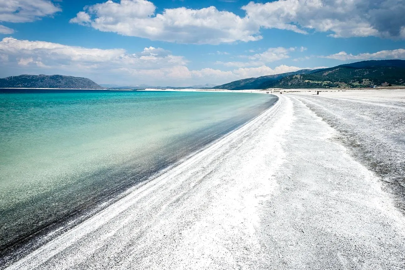 White shoreline and turquoise water at Lake Salda